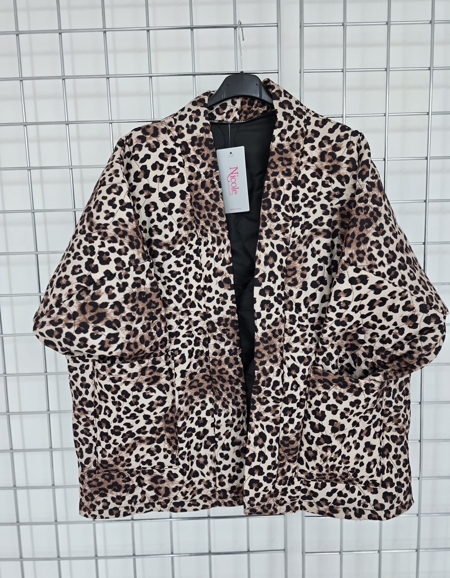 Sienna quilted jacket featuring animal print and contrast black lining