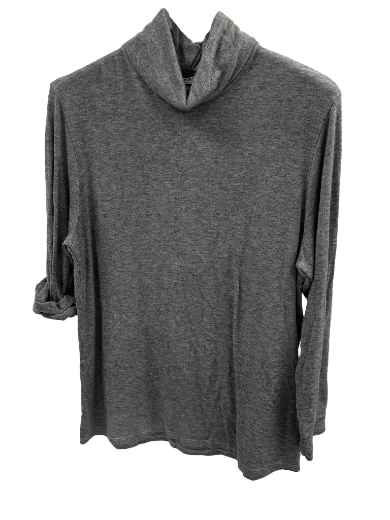 Women's wholesale roll neck plush sweater in soft, luxurious fabric, perfect for cozy styling