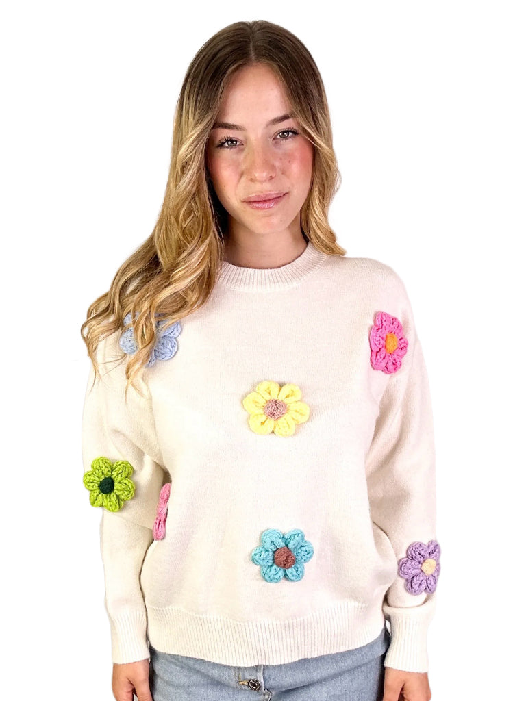 Women's wholesale soft knit sweater with flower appliqué
