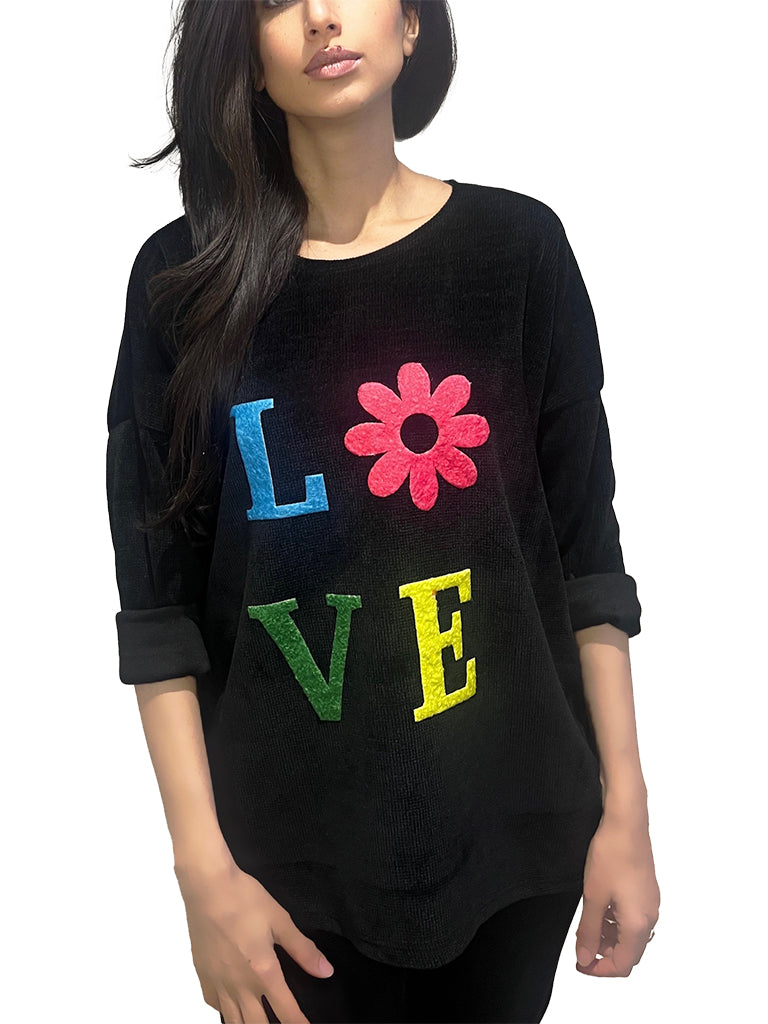 Women's wholesale chenille top with embossed 'LOVE' design and flower detail for the 'O', perfect for spring