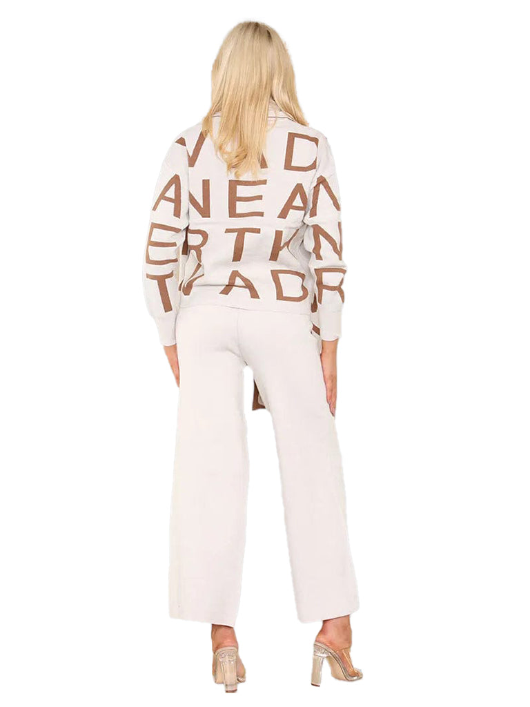 Women's wholesale 3-piece knit coord set featuring a lettered jumper, matching trousers, and a reversible scarf
