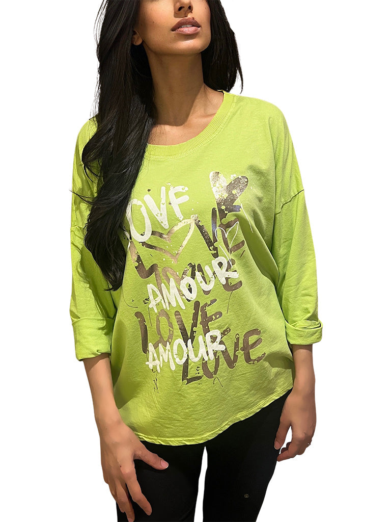 Women's wholesale dipped hem top with graffiti-style 'Love Amour' print and roll-up sleeves