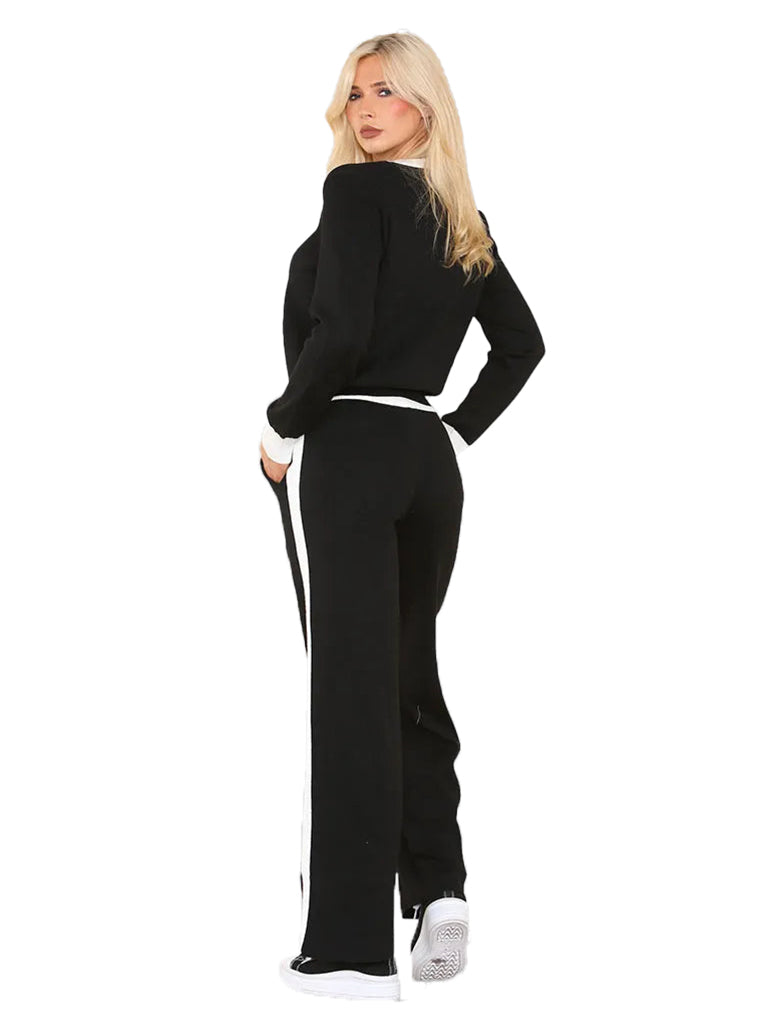 Women's knit jumper and wide leg trouser coord set with applique flower detail, featuring an elasticated waist