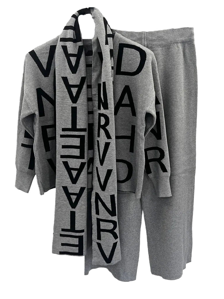 Women's wholesale 3-piece knit coord set featuring a lettered jumper, matching trousers, and a reversible scarf