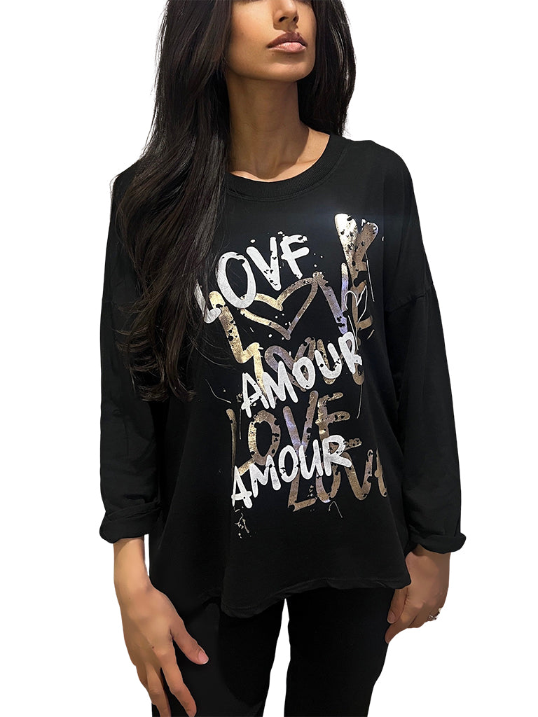 Women's wholesale dipped hem top with graffiti-style 'Love Amour' print and roll-up sleeves