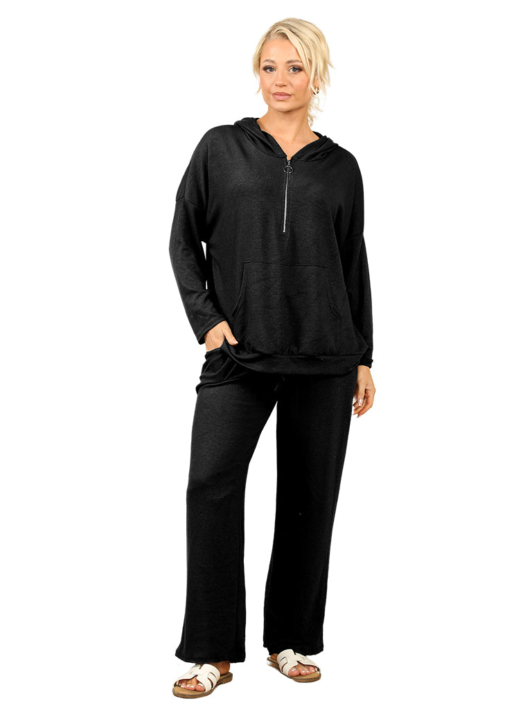 Women's wholesale jogger set with hooded zip-up top and straight leg jogger trousers.