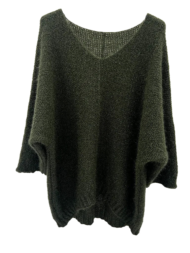 Women's wholesale oversized V neck sweater with a dipped hem, crafted from soft light-knit fabric