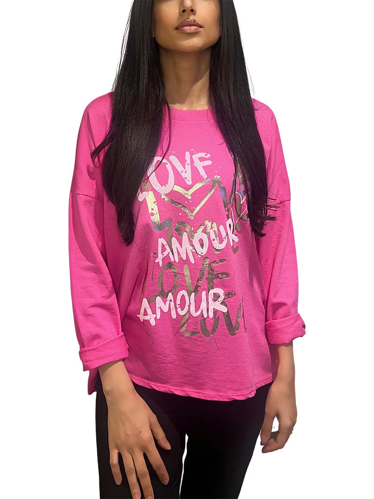 Women's wholesale dipped hem top with graffiti-style 'Love Amour' print and roll-up sleeves